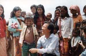 Dr. Haing S. Ngor provides humanitiarian aid in Cambodia. Photo by Jack Ong, courtesy The Dr. Haing S. Ngor Archive.